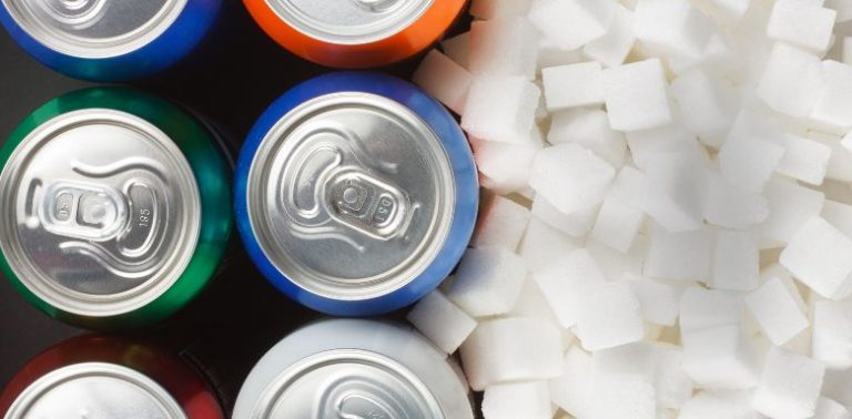 Cans of soda and sugar cubes.